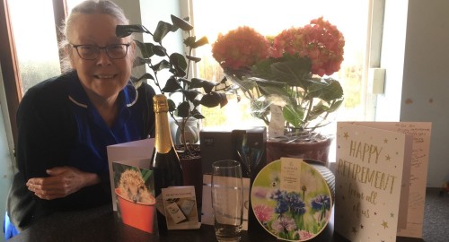 Jenny Clarke with her retirement gifts from the Inclusion Nursing team
